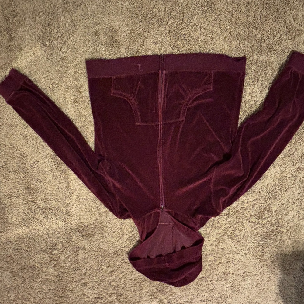 small burgundy zip up jacket.